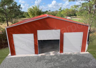 large red and white metal storage building